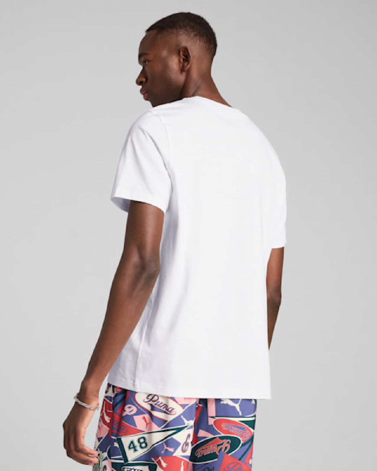 Image of Men's T-Shirt PUMA WARDROBE ESS SPORTS LEGACY Front Graphic Tee
